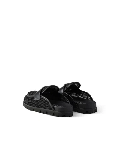 Prada Triangle Logo Mules In Black