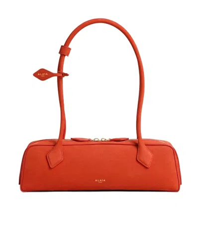 Alaïa Le Teckel Medium Nubuck Shoulder Bag In Orange
