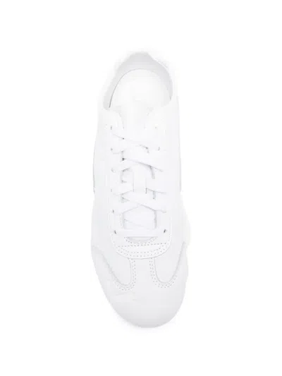 Puma Logo-debossed Sneakers In Multi