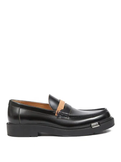 Maison Margiela Sophisticated Loafers For Men In Black