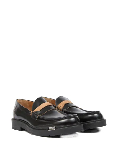 Maison Margiela Sophisticated Loafers For Men In Black