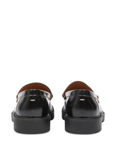 Maison Margiela Sophisticated Loafers For Men In Black