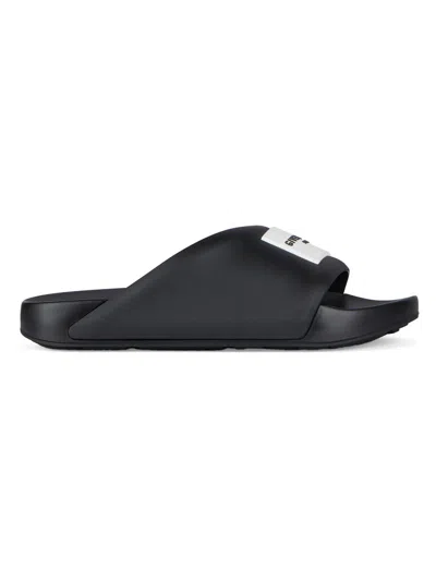 Givenchy Contoured Footbed Logo Slipper For Women In Black