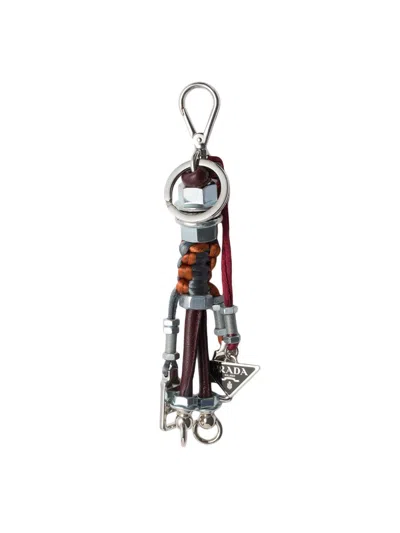 Prada Triangle Logo Robot Keyring In Metallic