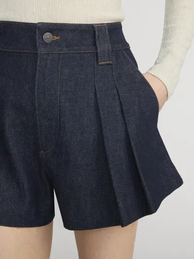Frame The Structural Pleated Denim Shorts In Blue