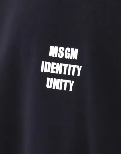 Msgm Slogan Printed Cotton Pullover In Black