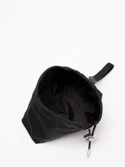 Moncler Compact Handheld Pouch Handbag With Logo Detail In Black