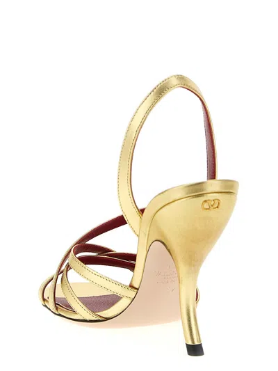 Valentino Garavani Fetishique Sandal In Laminated Nappa 105mm Woman Antique Brass 38.5 In Gold