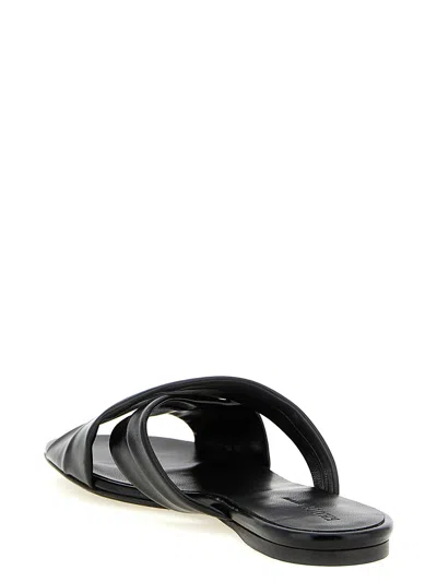 Khaite Liria Glossed-leather Sandals In Black