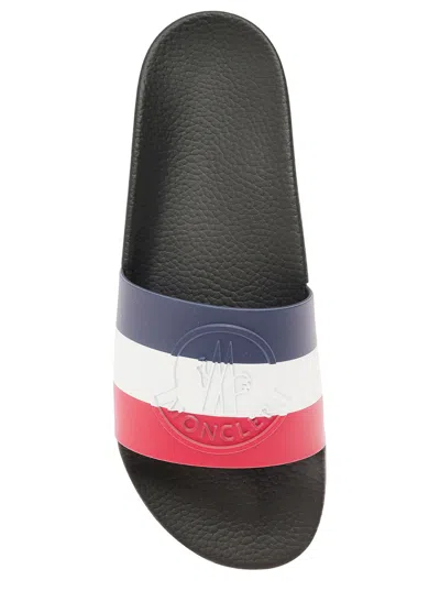 Moncler Basile Logo-embossed Striped Rubber Slides In Black