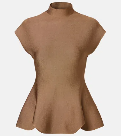 Khaite Andra Stretch-knit Turtleneck Peplum Top In Brown