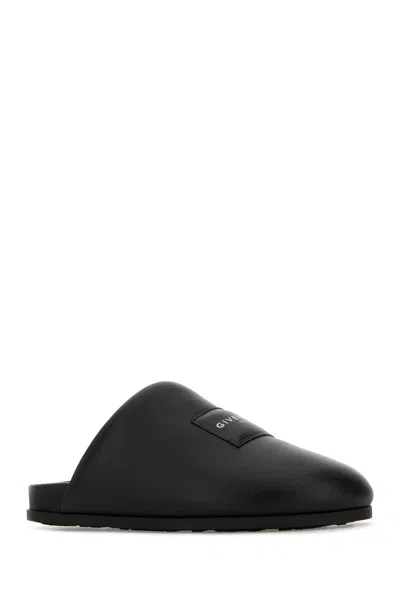 Givenchy Leather Slippers Featuring Flat Sole Design In Black