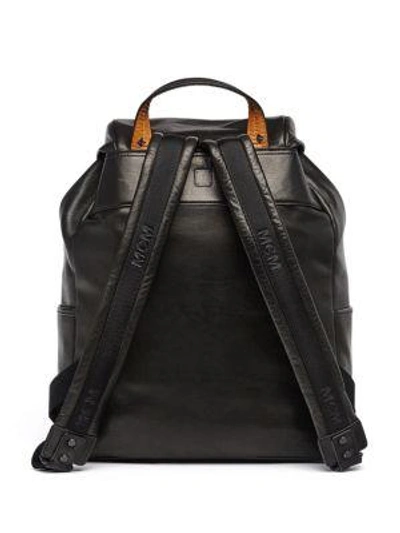 Shop Mcm Killian Lambskin Backpack In Black