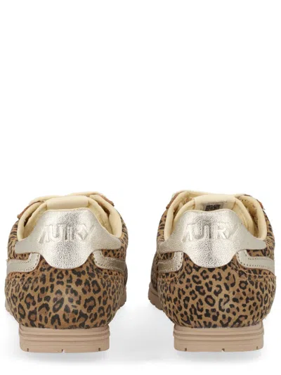 Autry Brushed Suede And Leather Sneakers With Jacquard Logo In Multi