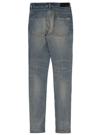 Amiri Distressed Jeans In Blue