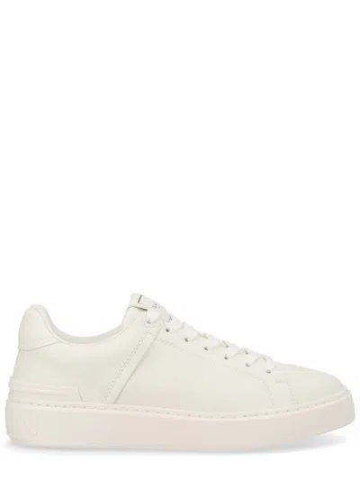 Balmain Logo-embossed Leather Sneakers In Neutral
