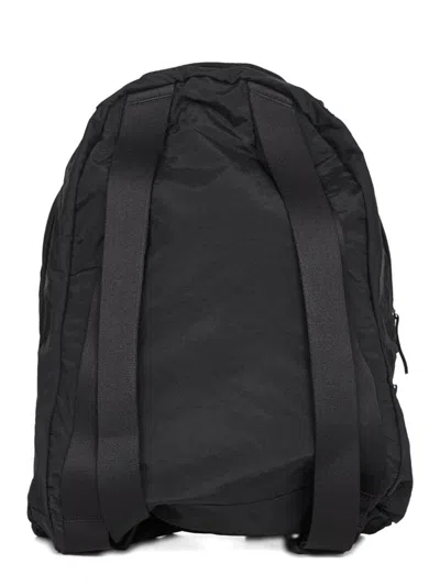 Stone Island Adjustable Strap Logo Backpack With Multiple Pockets In Black