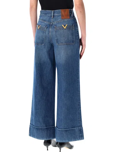 Valentino Garavani Denim Trousers With V Gold In Blue