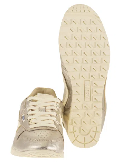 Autry Windspin Leather Trainers In Silver