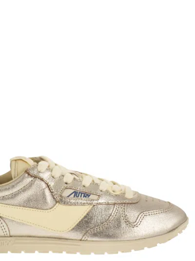 Autry Windspin Leather Trainers In Silver