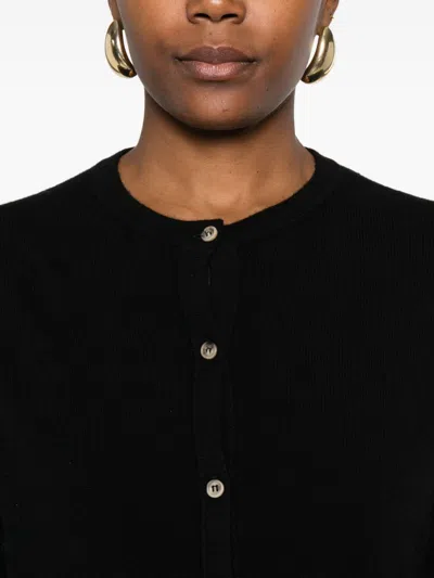 Soft Goat Buttoned Crew Neck Sweater In Black