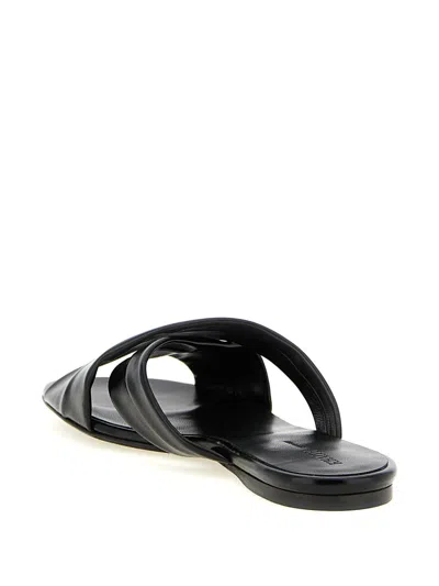Khaite Liria Glossed-leather Sandals In Black