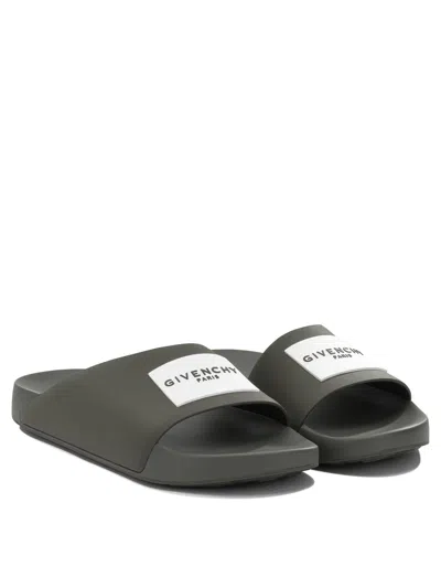Givenchy Label Slide Flat Mules In Rubber In Multi