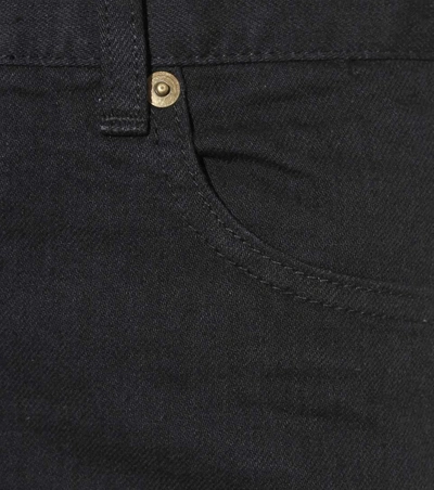 Shop Saint Laurent Flared Jeans In Black