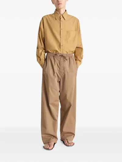 Lemaire Drawstring Trousers In Brown