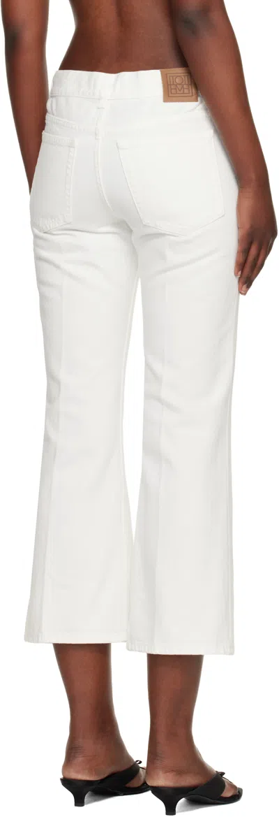 Totême Toteme Kick Flared-leg Denim Jeans In Multi