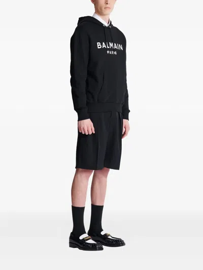 Balmain Logo Printed Drawstring Sweatshirt In Black