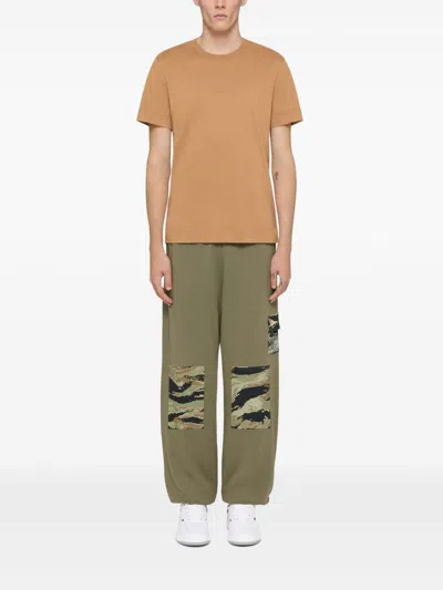 Givenchy Camouflage Patch Sweatpants In Green