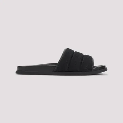Gucci Gg-patterned Padded Slide Sandals In Black