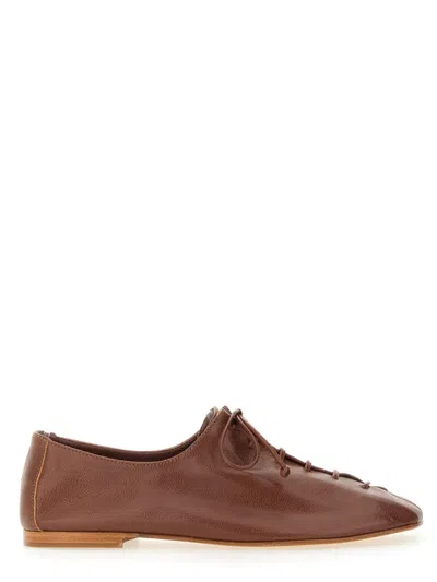 Hereu Elegant Lambskin Moccasin Slip-ons For Women In Brown