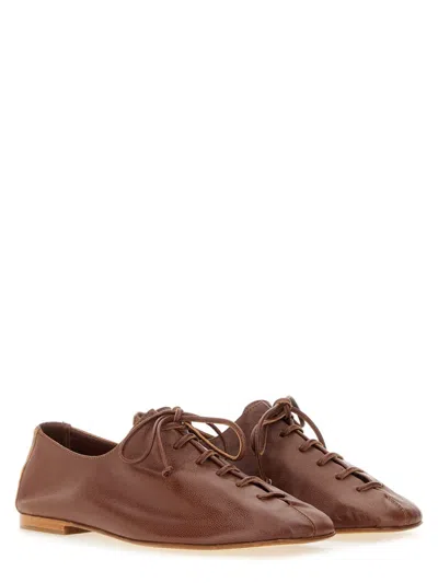 Hereu Elegant Lambskin Moccasin Slip-ons For Women In Brown