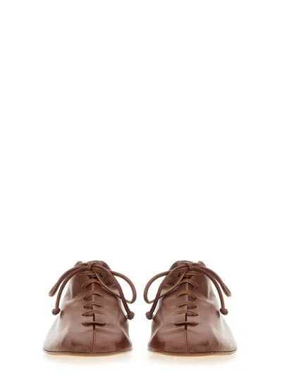 Hereu Elegant Lambskin Moccasin Slip-ons For Women In Brown