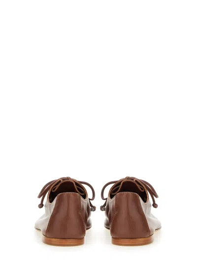 Hereu Elegant Lambskin Moccasin Slip-ons For Women In Brown