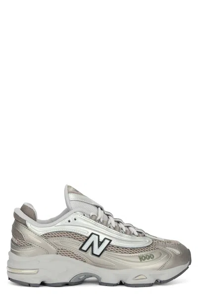 New Balance Contemporary Sneakers Featuring Mesh Panels And Reflective Accents In White