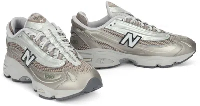 New Balance Contemporary Sneakers Featuring Mesh Panels And Reflective Accents In White