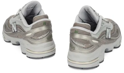 New Balance Contemporary Sneakers Featuring Mesh Panels And Reflective Accents In White