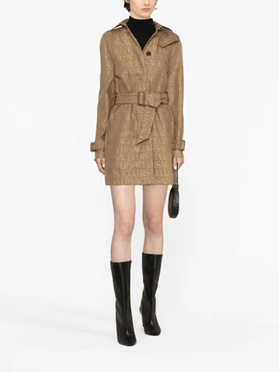 Versace Trench Coat With Allover Motif And Belted Waist In Brown