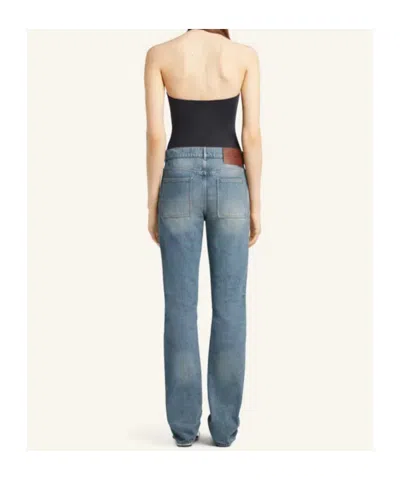 Courrèges Logo Patch Jeans In Blue