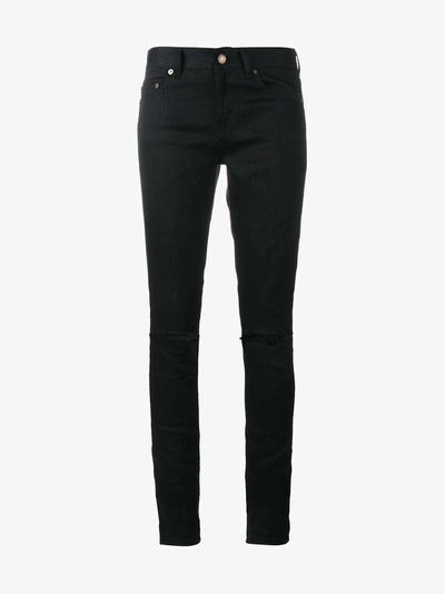 Shop Saint Laurent Distressed Skinny Jeans In Black