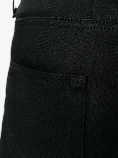 Shop Saint Laurent Distressed Skinny Jeans In Black