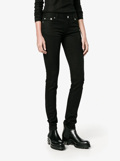 Shop Givenchy Star Motif Skinny Jeans In Black