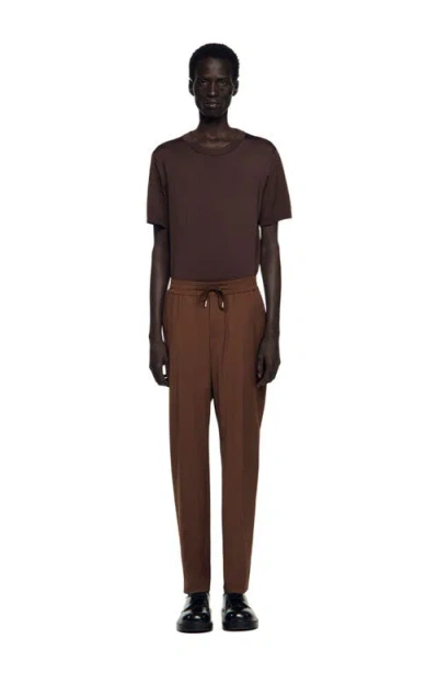 Sandro Elasticated Straight-leg Trousers In Brown