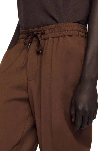 Sandro Elasticated Straight-leg Trousers In Brown