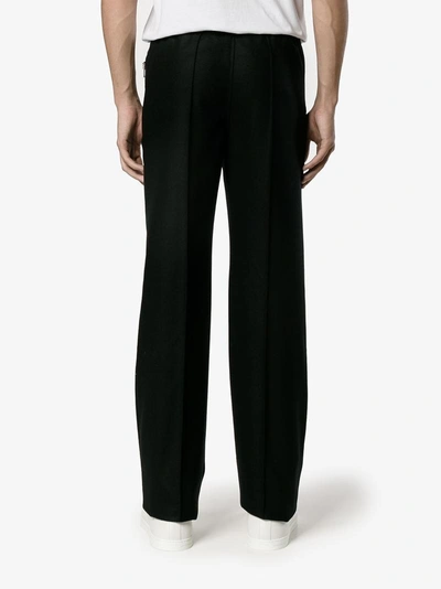 Shop Givenchy Raised Seam Trousers In Black