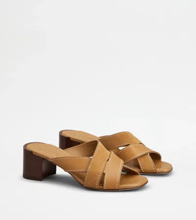 Tod's Suede And Leather Mules In Brown