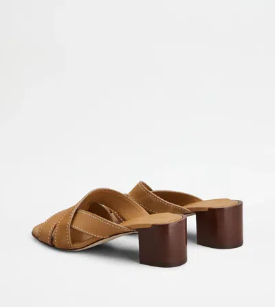 Tod's Suede And Leather Mules In Brown